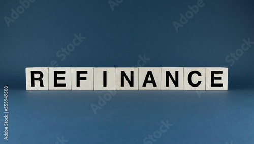 Refinance. Cubes form the word Refinance. Business concept