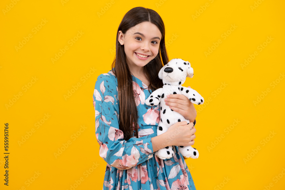 Cheerful teen child hold toy. Happy childhood. Kid playing toy. Childcare concept. Cheerful teen child hold toy. Happy childhood. Kid playing toy. Childcare concept.