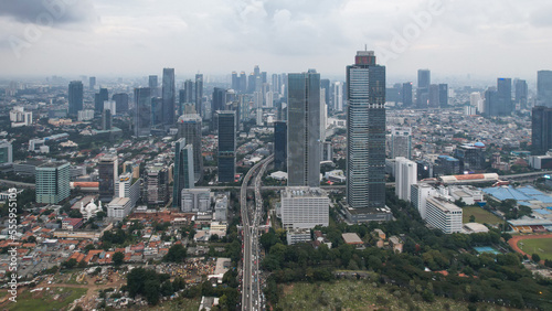 Aerial view of Asia Business concept for real estate - panoramic modern cityscape building bird eye aerial view and morning blue bright sky in Jakarta.  © syahrir