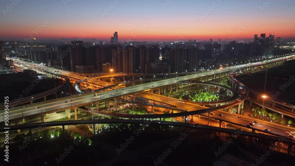 Aerial top view photo of highway multilevel junction road in urban at night Aerial top view photo of highway multilevel junction road in urban at night