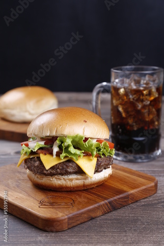 hamburger with glass of soda