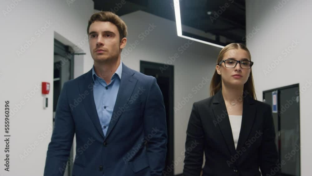 Business people walking corridor together. Successful executive staff go meeting Business people walking corridor together. Successful executive staff go meeting