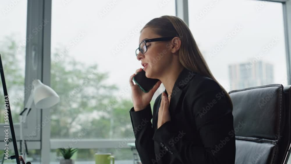 Office manager complaining phone closeup. Upset woman executive talk cellphone