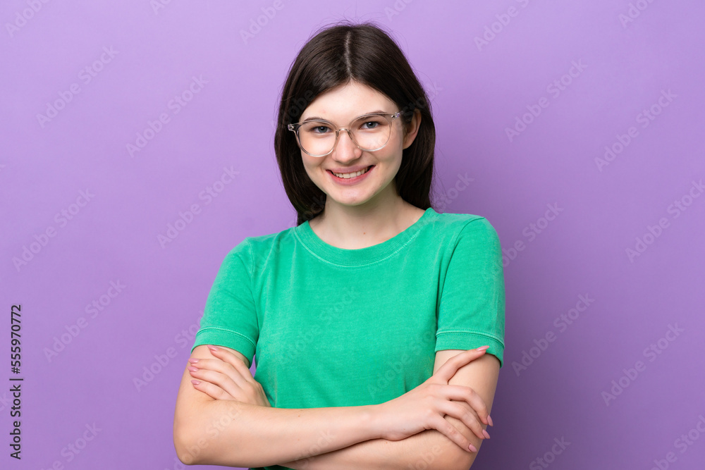 Young pretty Russian woman isolated on purple background With glasses with happy expression Young pretty Russian woman isolated on purple background With glasses with happy expression