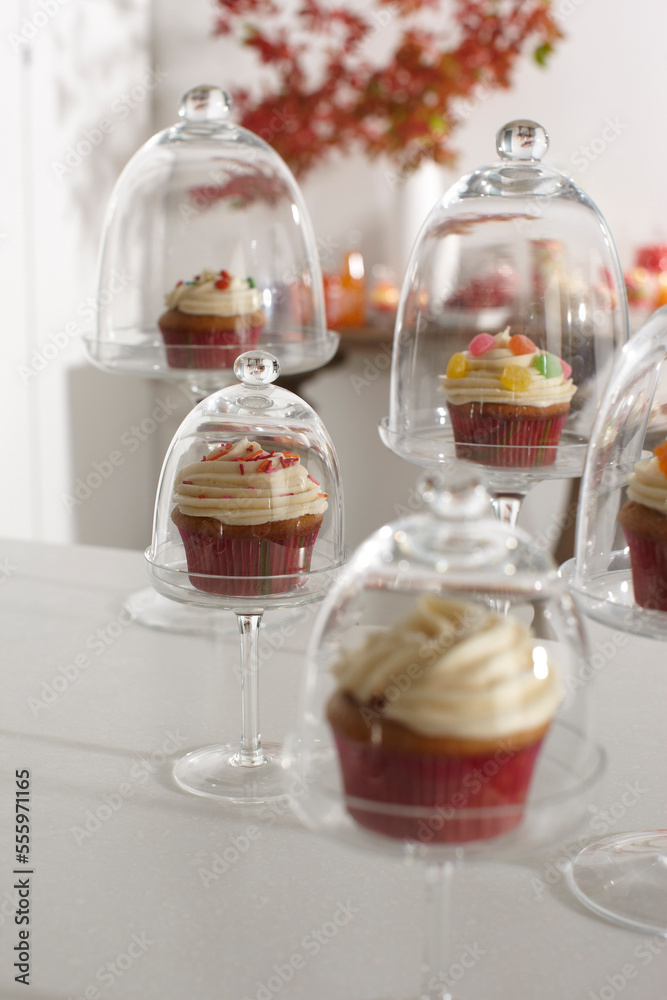 Cupcakes Displayed in Cake Stands for Party, Studio Shot Cupcakes Displayed in Cake Stands for Party, Studio Shot