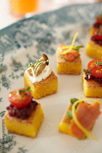 Close-up of Cocktail Party Polenta Square Appetisers, Studio Shot