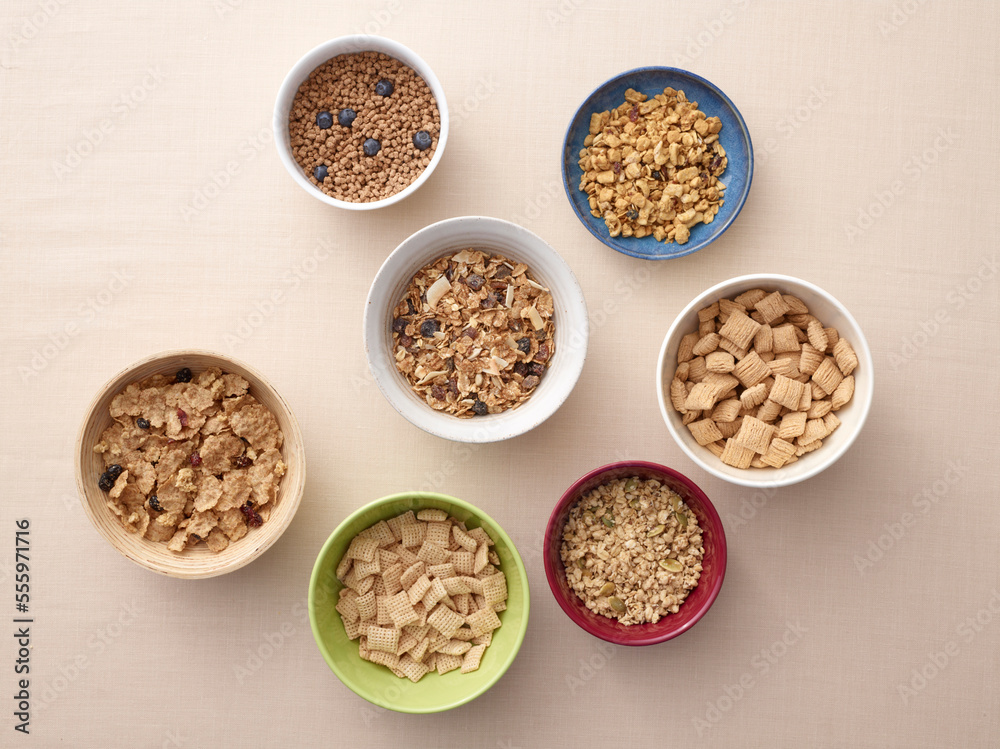 Overhead view of bowls of a variety of healthy cereals, studio shot Overhead view of bowls of a variety of healthy cereals, studio shot
