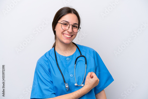 surgeon doctor woman holding tools isolated on white background celebrating a victory