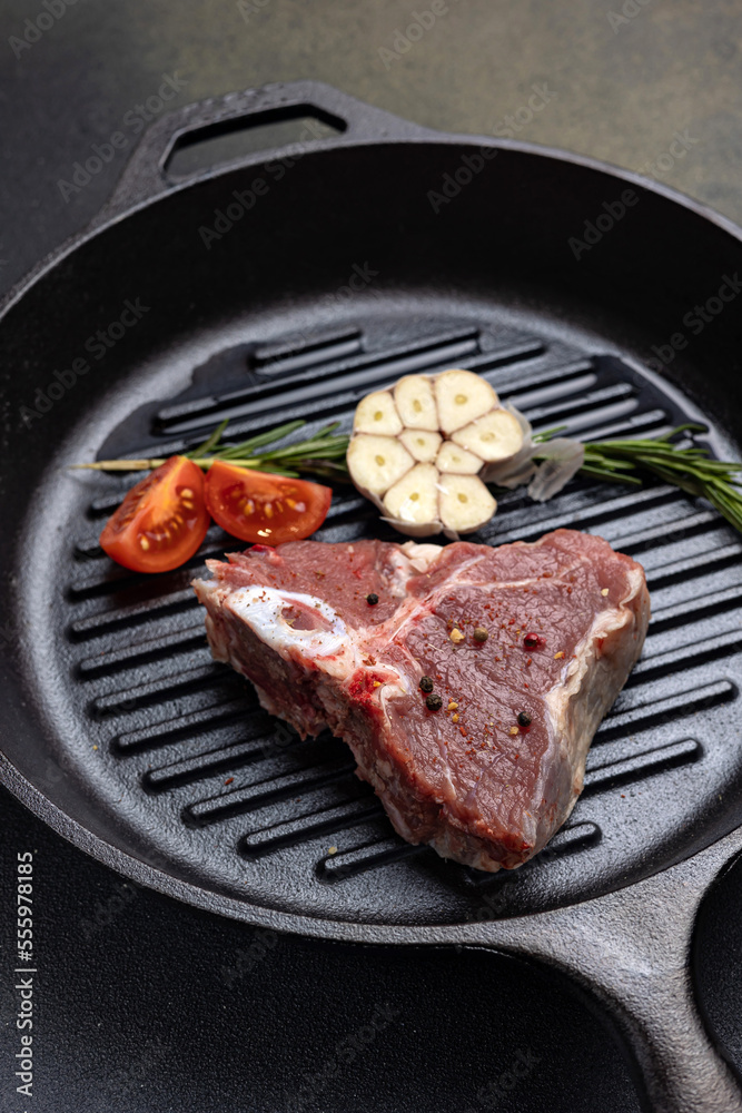 raw meat on a dark background
raw meat on a dark background