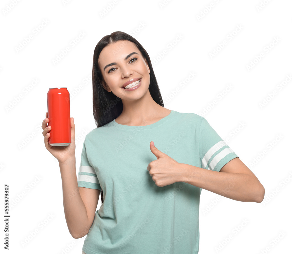 Beautiful happy woman holding red beverage can and showing thumbs up on white background Beautiful happy woman holding red beverage can and showing thumbs up on white background