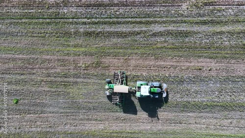Tractor working. Agricultural landscape. Aerial view from a drone. Berdun. Municipality of the Canal de Berdún.The Jacetania. Huesca, Aragon, Spain, Europe photo