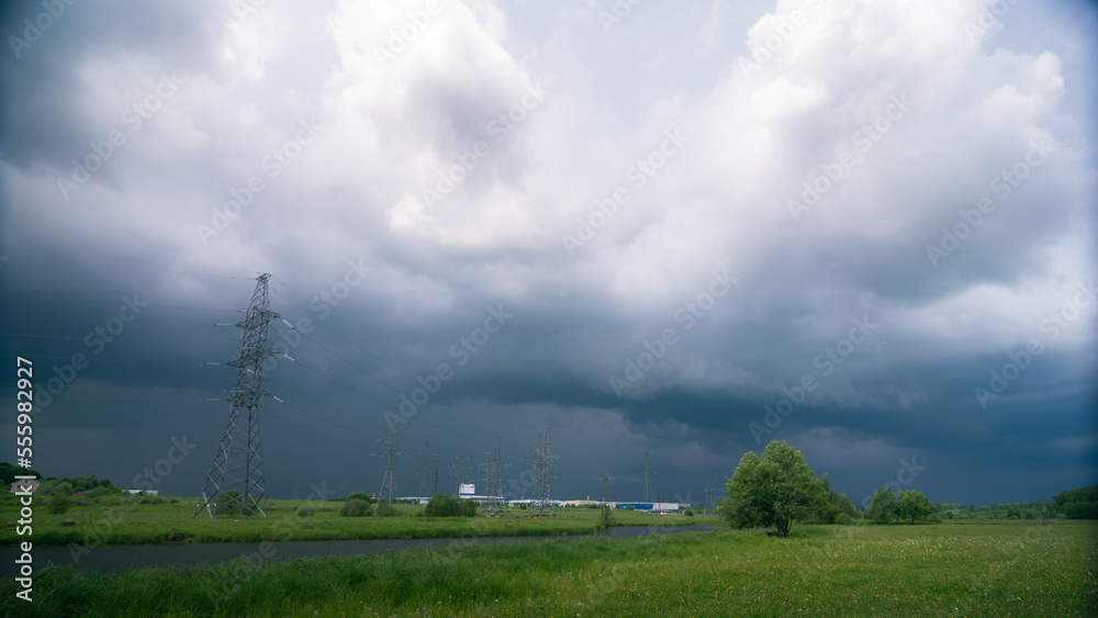 Thunderstorm approaching to power line