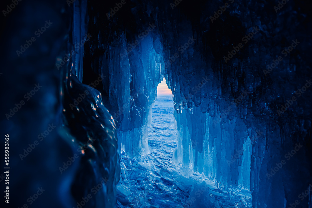 Ice grotto cave, frozen lake