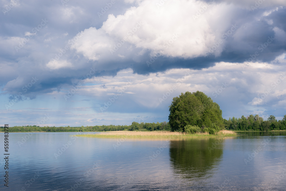 lake with clouds in summer noon