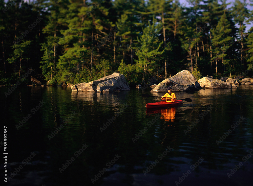 Woman Kayaking, Belgrade Lakes, Maine, USA Woman Kayaking, Belgrade Lakes, Maine, USA
