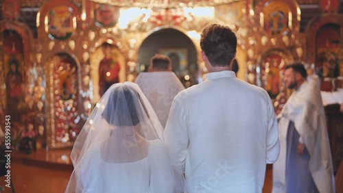Newlyweds at a church wedding ceremony.
