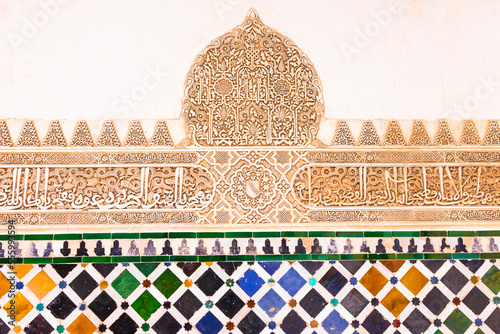 amazing Alhambra palace - mosaic and carved walls in arabian style in Granada, Andalusia, Spain
