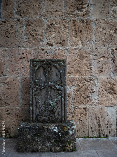 Armenian khachkars at the wall of an ancient monastery. Stone steles with carvings  a national treasure