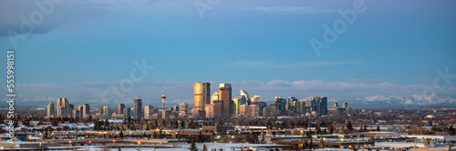 Calgary, Alberta, Canada city skyline with the mountains in the background.