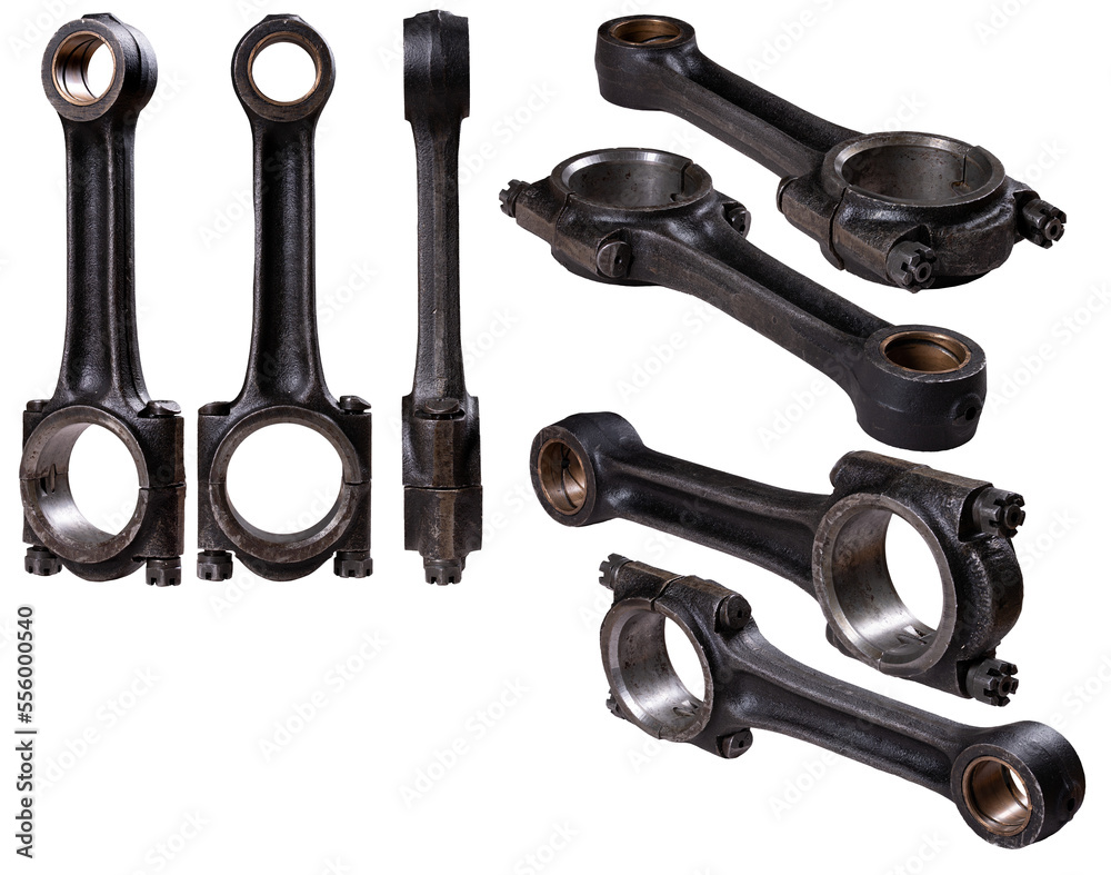 A connecting rod from a large internal combustion engine shown in different positions on an isolated background. A connecting rod from a large internal combustion engine shown in different positions on an isolated background.