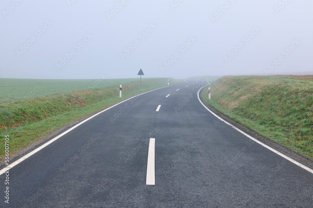 Rural Road on Foggy Spring Morning, Marktheidenfeld, Bavaria, Germany Rural Road on Foggy Spring Morning, Marktheidenfeld, Bavaria, Germany