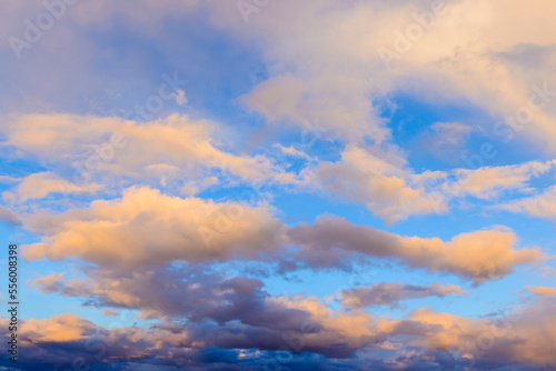 Clouds and blue sky at sunset over the Isle of Skye in Scotland, United Kingdom photo