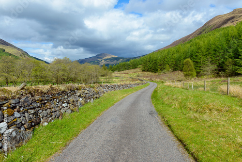 Scottish single track road in spring along the River Orchy in Scotland, United Kingdom