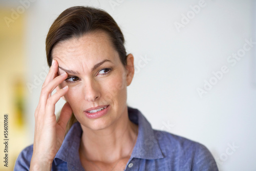 Woman Touching Head, Florida, USA photo