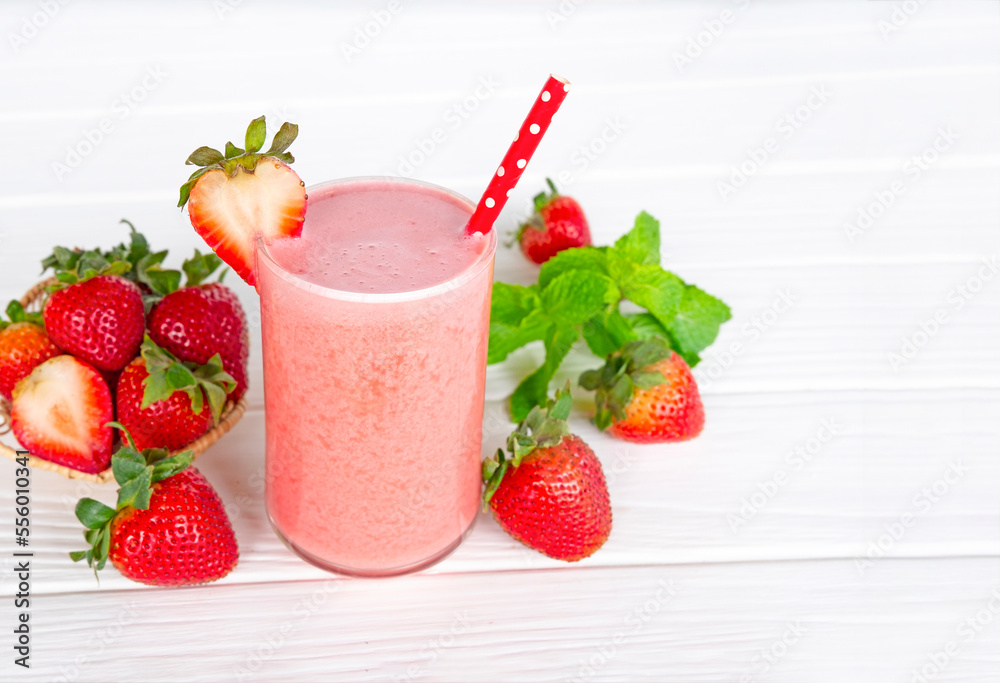 Strawberry yogurt fruit juice smoothie pink colorful fruit juice milkshake blend beverage healthy high protein the taste yummy In glass drink episode morning on white wood background.