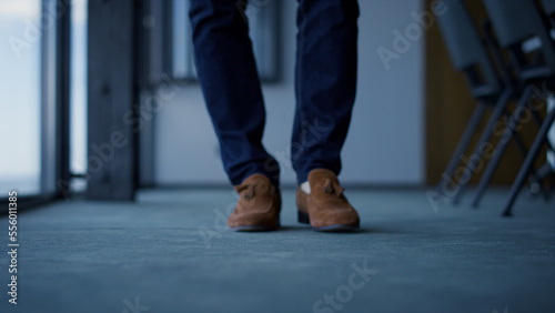 Businessman leather shoes waiting office closeup. Unknown confident man concept © stockbusters
