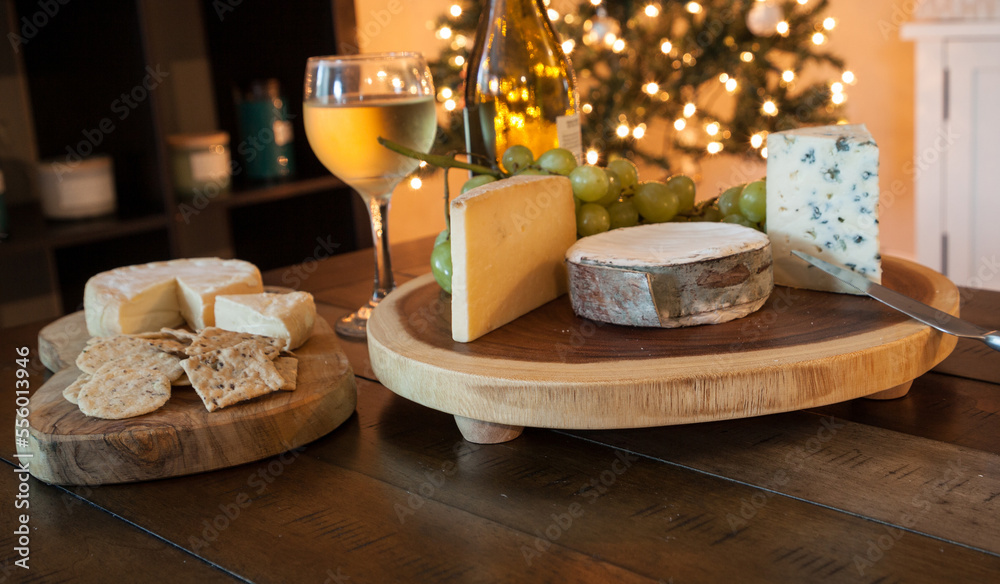 Cheese plate and wine including chardonnay, gourmet crackers