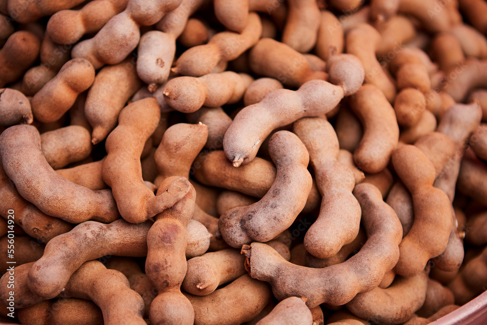 Ripe sweet tamarind fruit in the basket Ripe sweet tamarind fruit in the basket