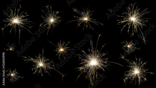 Lit Sparklers Against Black Background