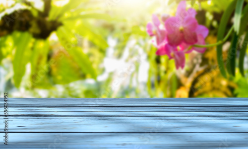 Beautiful wooden floor and bright floral nature background.