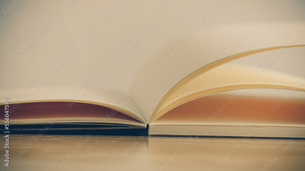 Recycled paper book on wooden background Recycled paper book on wooden background