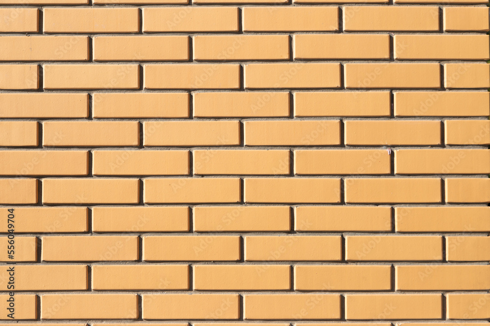 Yellow brick wall background texture, full frame. Modern new brick. Yellow brick wall background texture, full frame. Modern new brick.