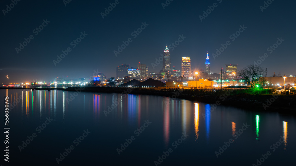 Cleveland at nighttime long exposure with colorful reflecting lights.