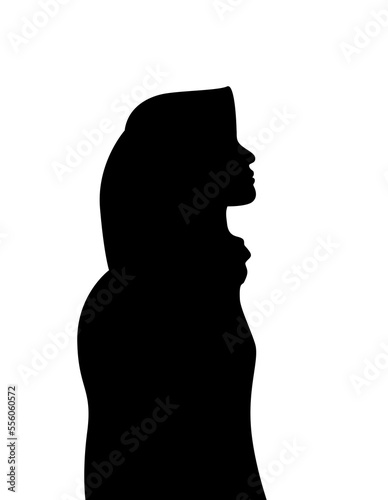 silhouette portrait of a woman in a headscarf looking up © Lotz