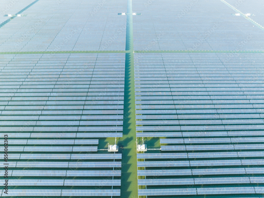 Aerial view of modern solar plant on water