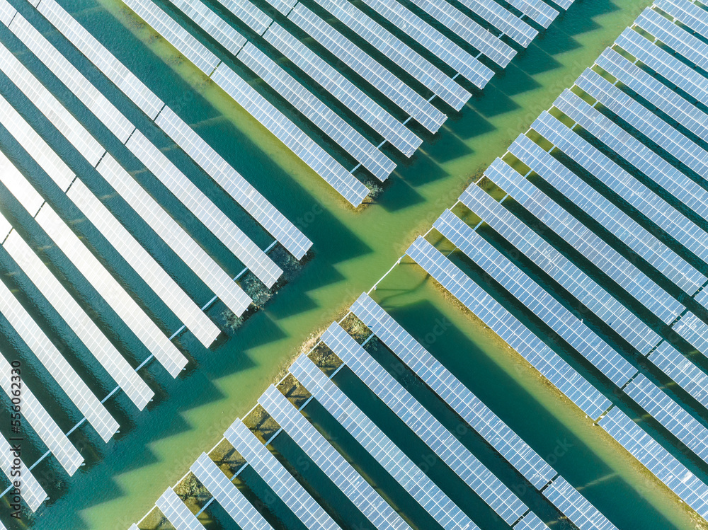 Aerial view of modern solar plant on water