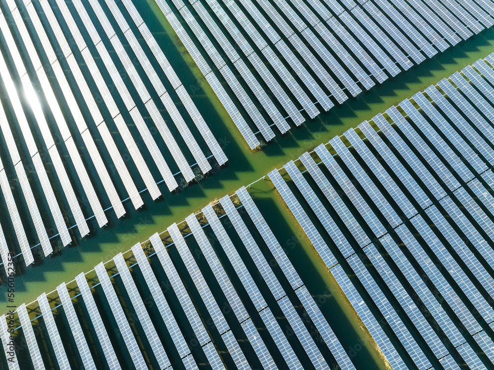 Aerial view of modern solar plant on water