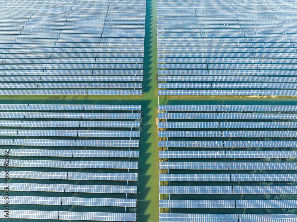 Aerial view of modern solar plant on water