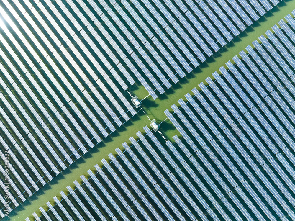 Aerial view of modern solar plant on water