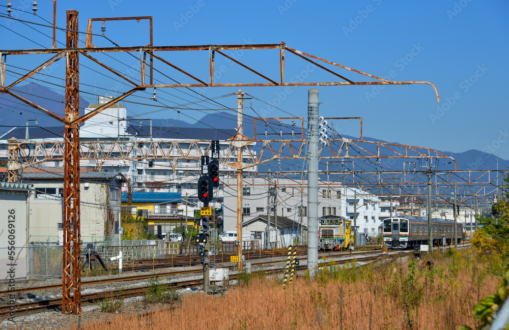 Train running on track in Gunma, Japan Train running on track in Gunma, Japan