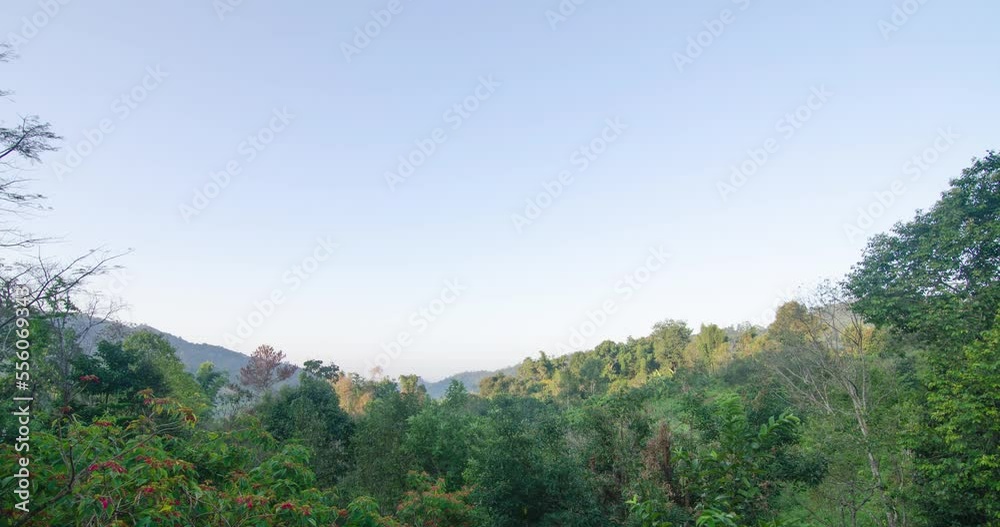 timelapse view of natural winter mountain range with some cloud fog.Flores tropical paradise. Mountain Range under clear blue sky, Aerial View. timelapse view of natural winter mountain range with some cloud fog.Flores tropical paradise. Mountain Range under clear blue sky, Aerial View.