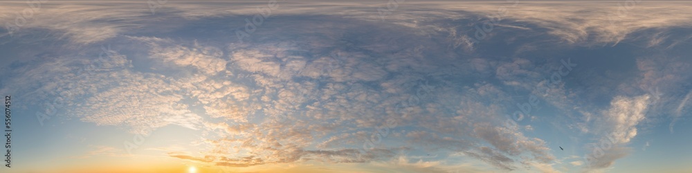 Dark blue sunset sky panorama with golden Cirrus clouds. Seamless hdr 360 panorama in spherical equirectangular format. Full zenith for 3D visualization, sky replacement for aerial drone panoramas.