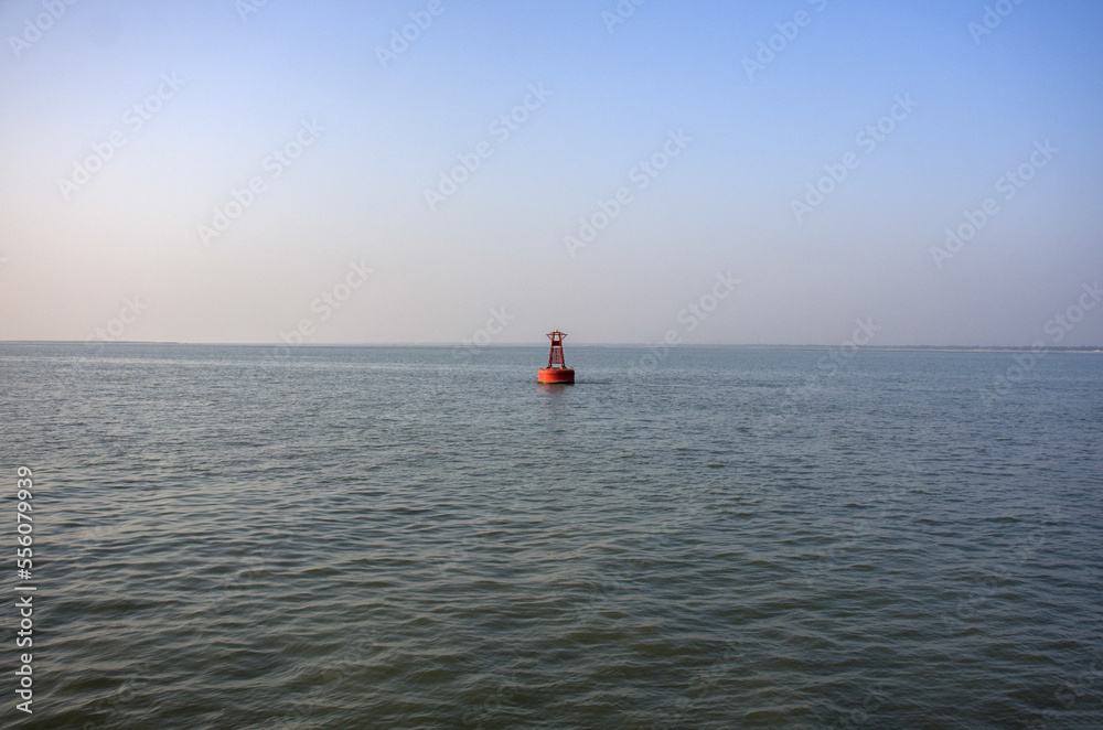 Floating pillars indicating the river course