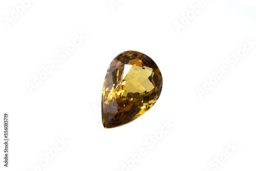 Natural grossular garnet gemstone on white background photo