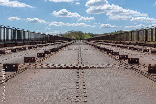 A disused rail bridge seen from where once the rails were