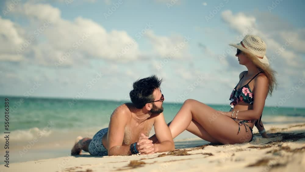happy couple enjoying beach at an all-inclusive resort happy couple enjoying beach at an all-inclusive resort